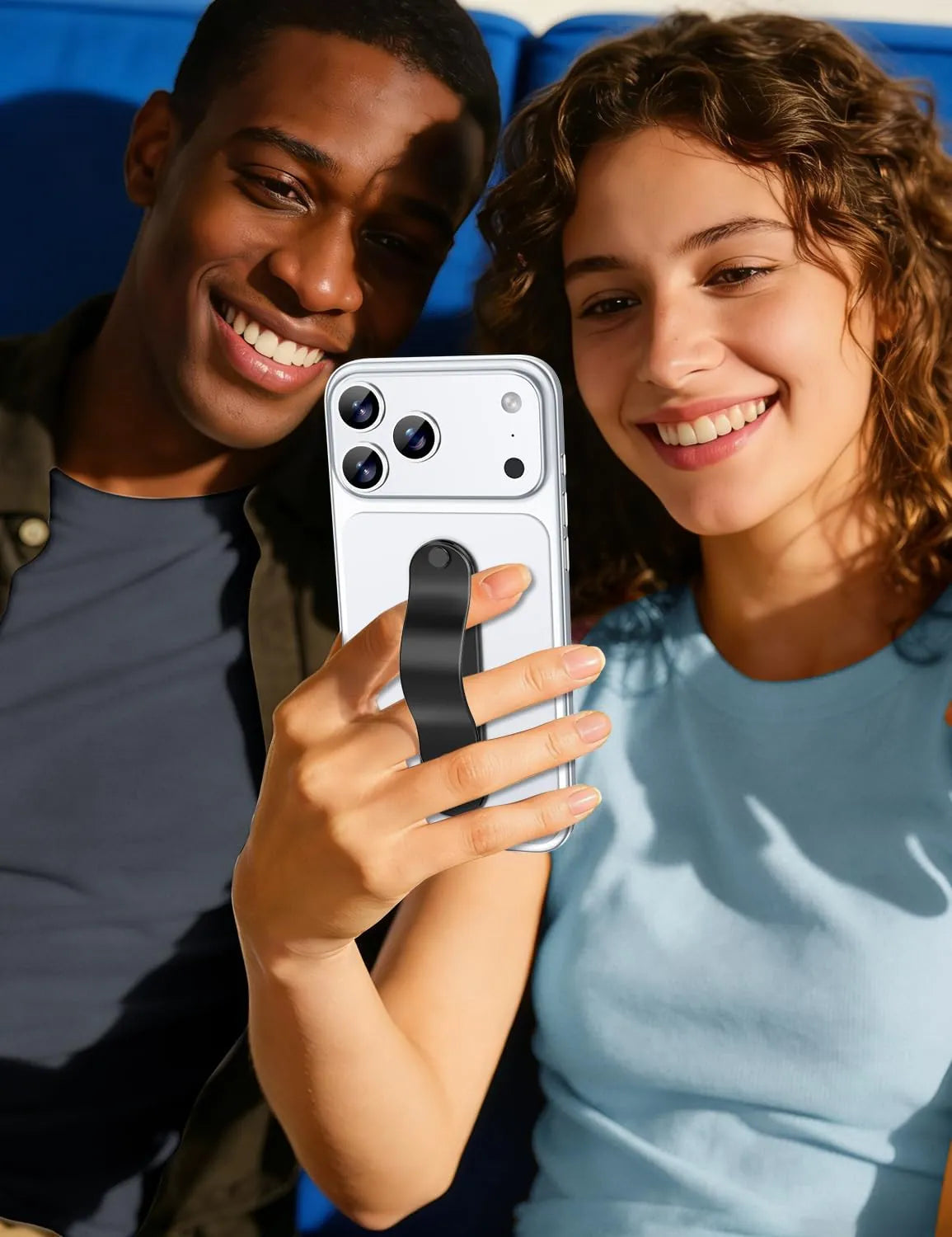 Gripmate Slim Black phone grip held one-handed for a selfie