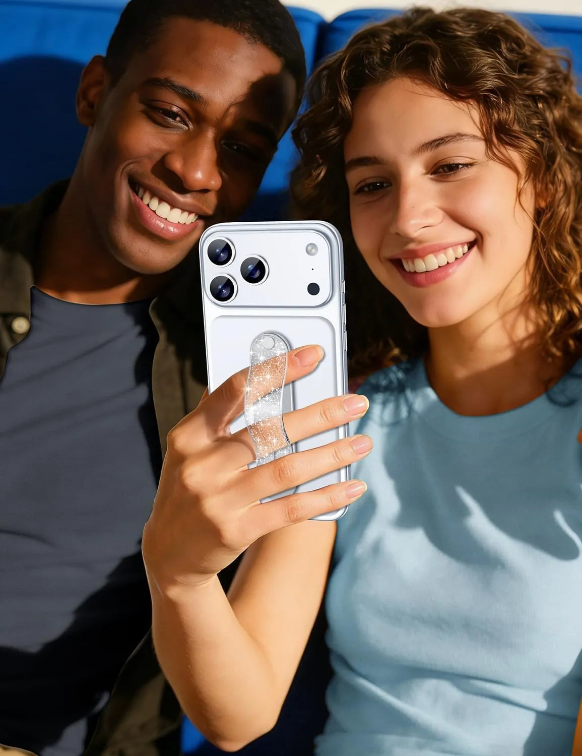 Gripmate Slim Glitter Silver phone grip held one-handed for a selfie